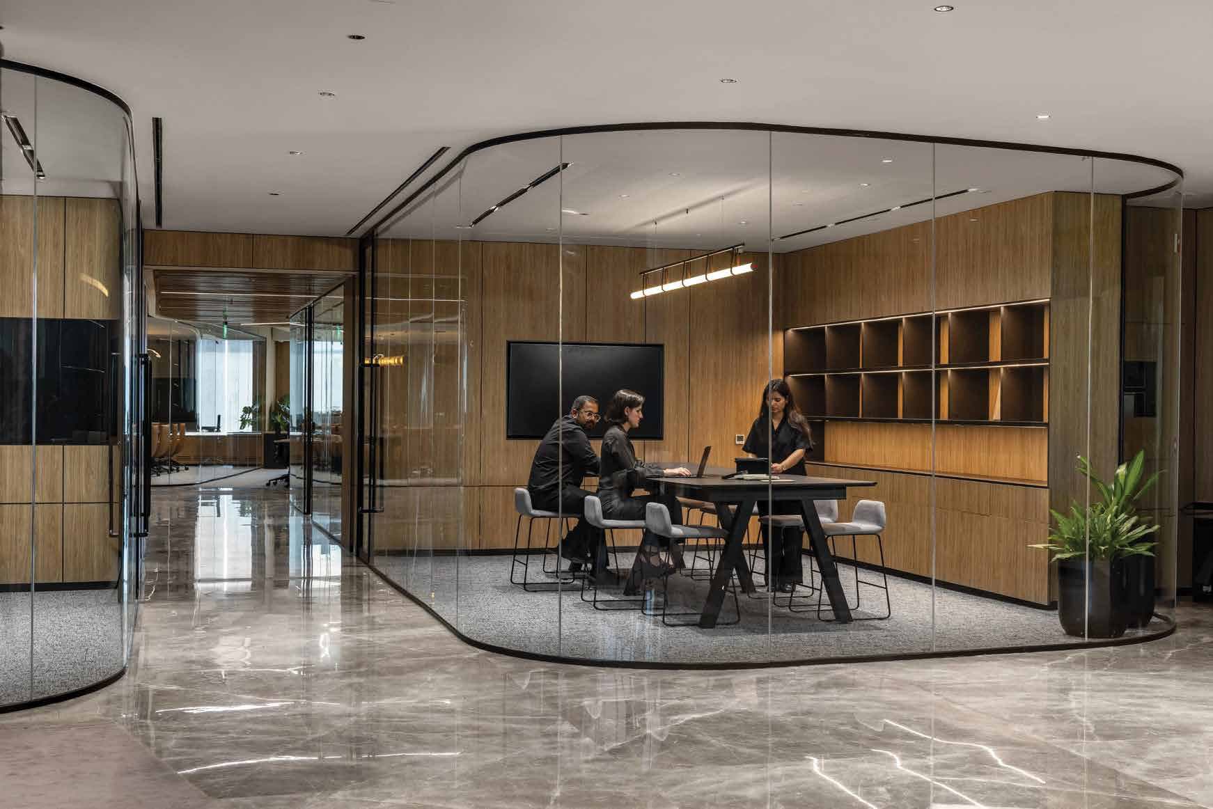 An Adlok-designed workspace with collaborative seating and warm timber finishes